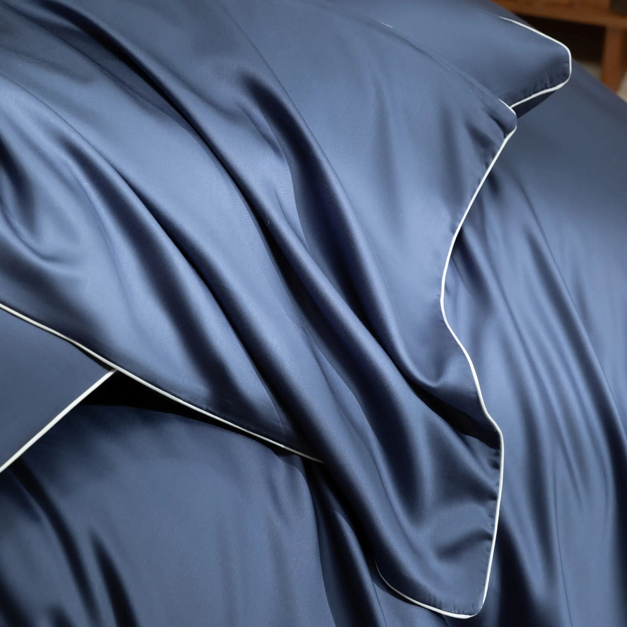 Tissue et plis de la matiere Tencel Lyocell, doux et soyeux pour des linges de lit haut de gamme.
