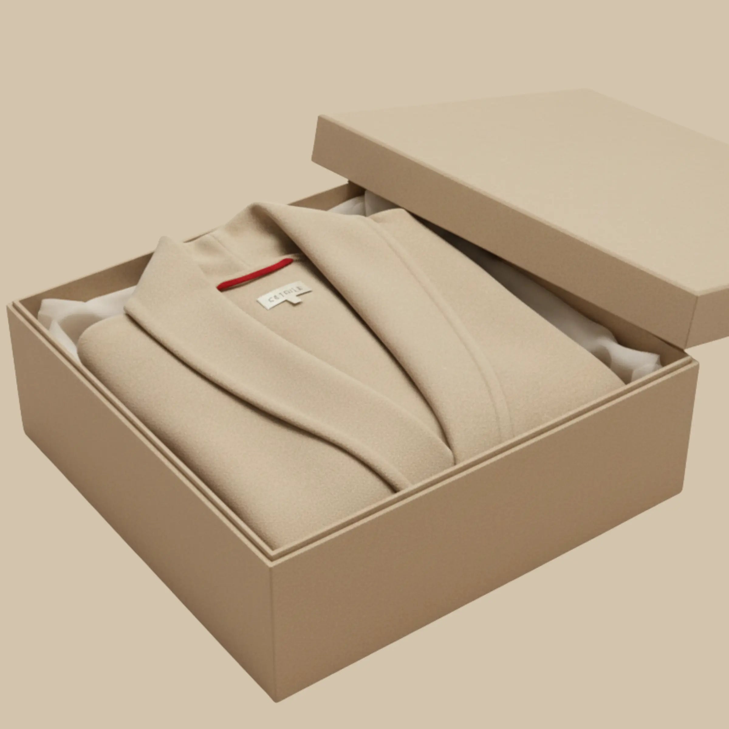 Coffret CÉTOILE en cachemire biologique ivoire, présenté dans une boîte beige premium - Maison CÉTOILE