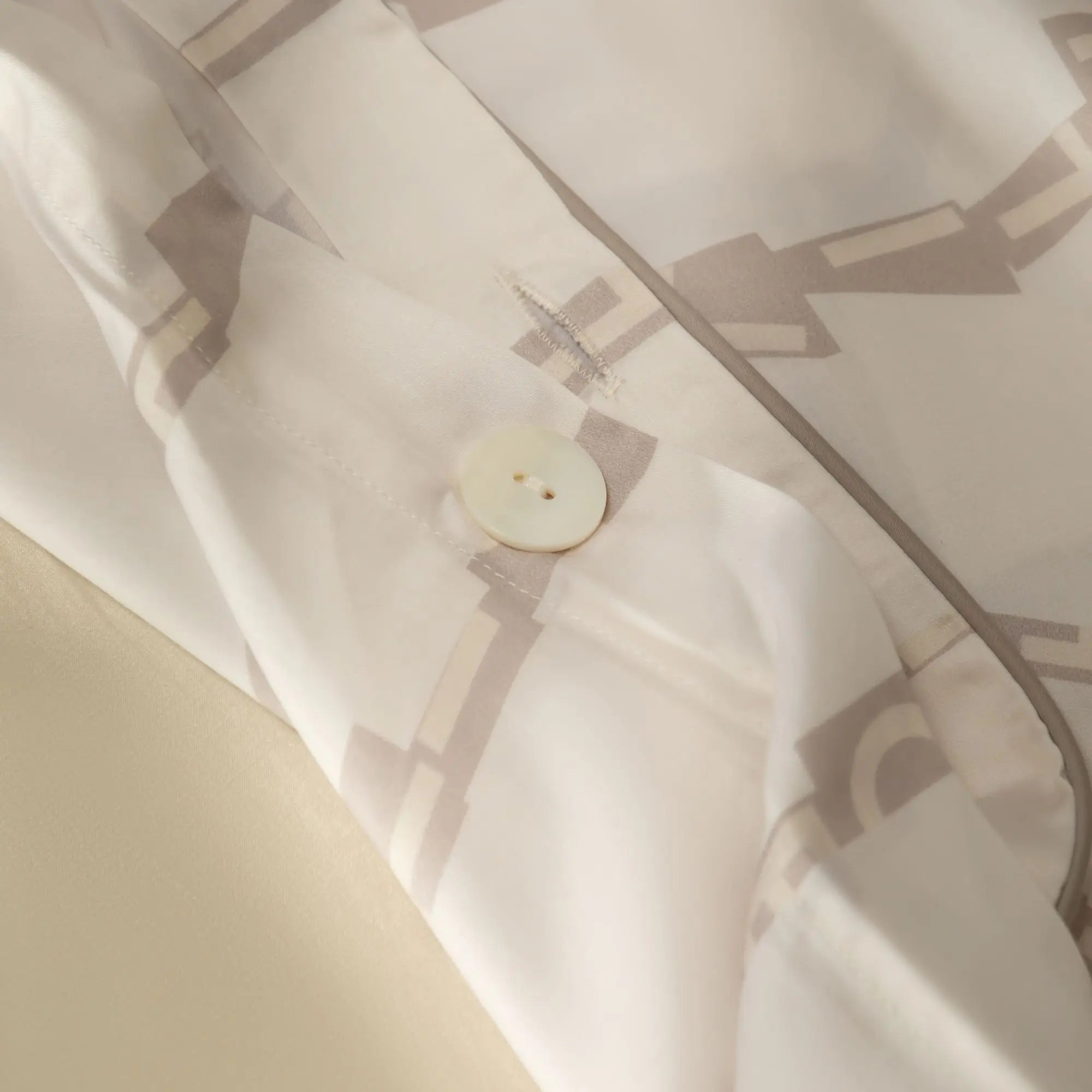 housse de couette en motif cétoile avec bouton nacré et passepoil raffiné - Maison CÉTOILE