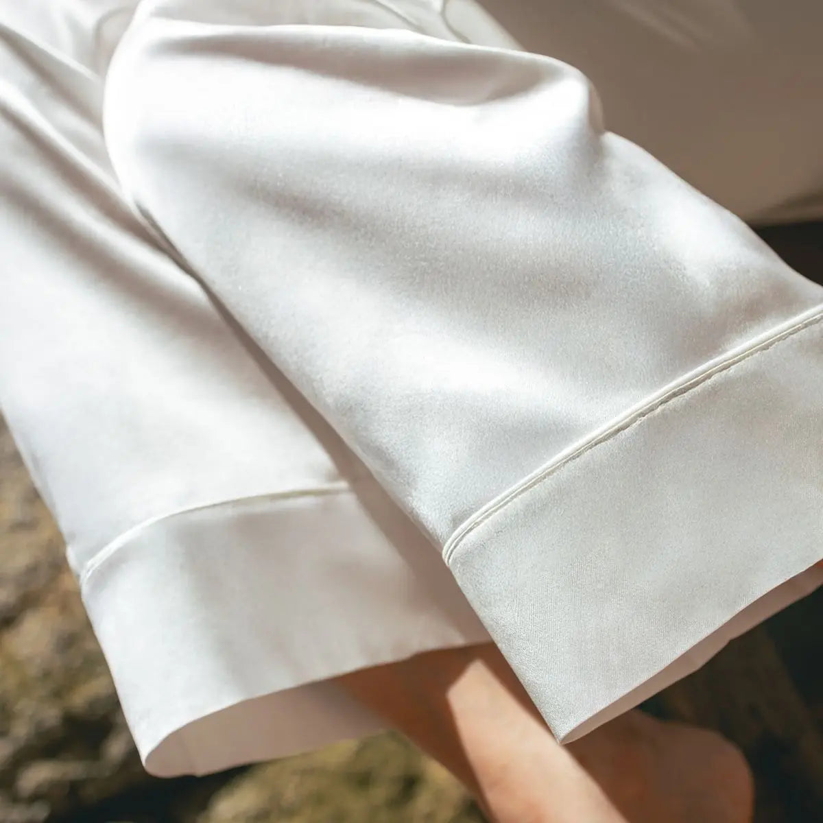 pantalon en soie naturelle couleur blanche pure avec passepoil raffiné - Maison CÉTOILE